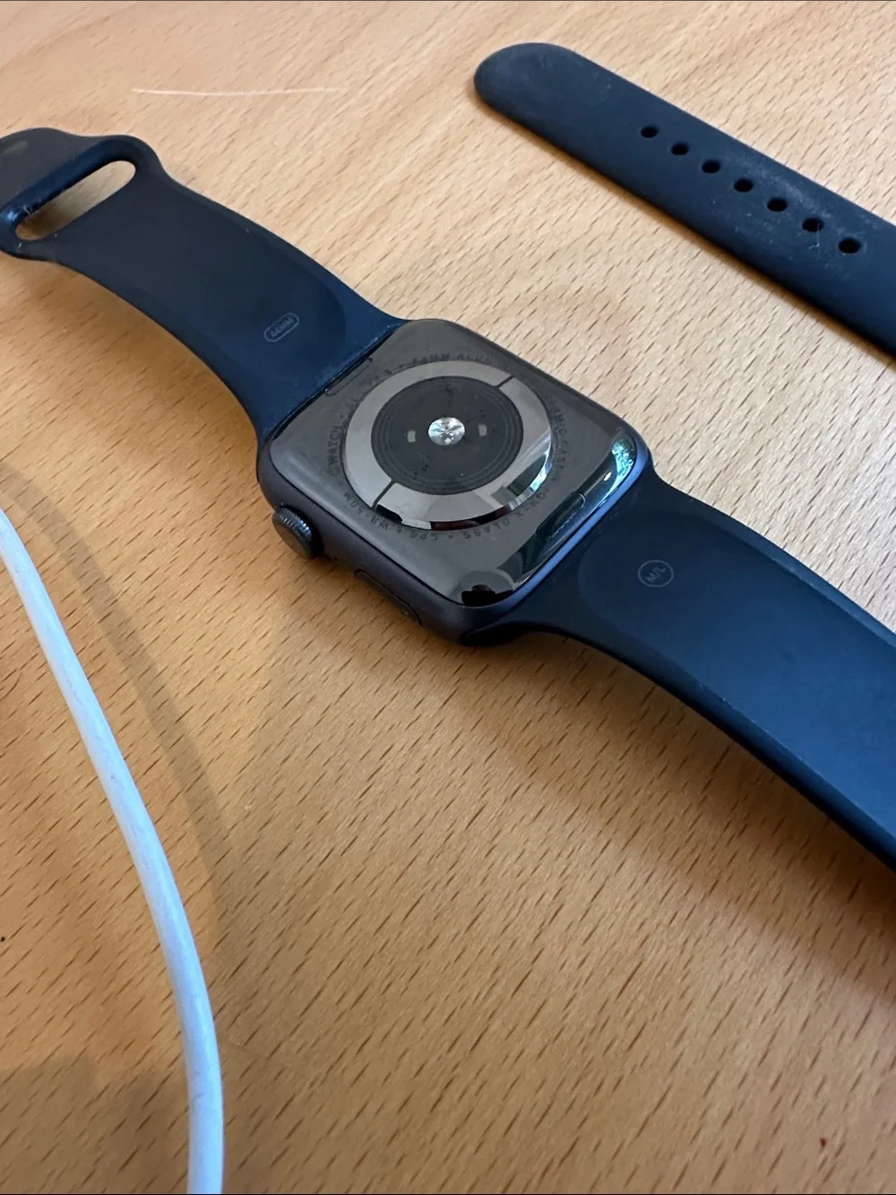 Apple Black Smartwatch with Black Silicone Band and Charger
